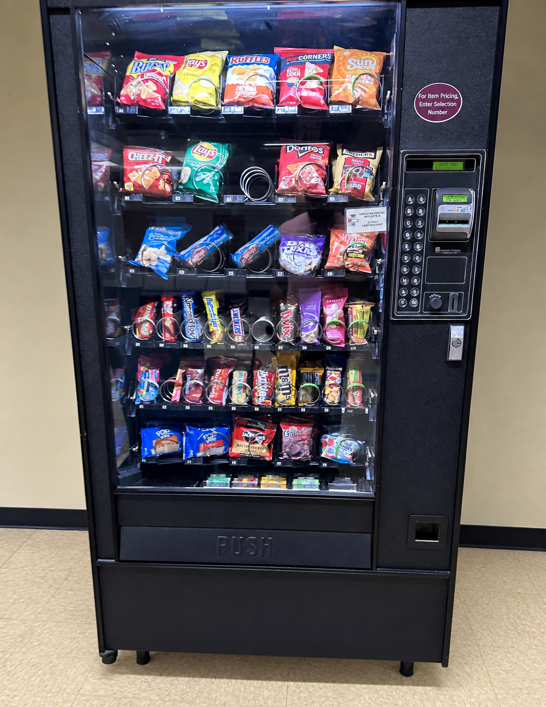 A stocked snack vending machine photographed for Vendrop setup